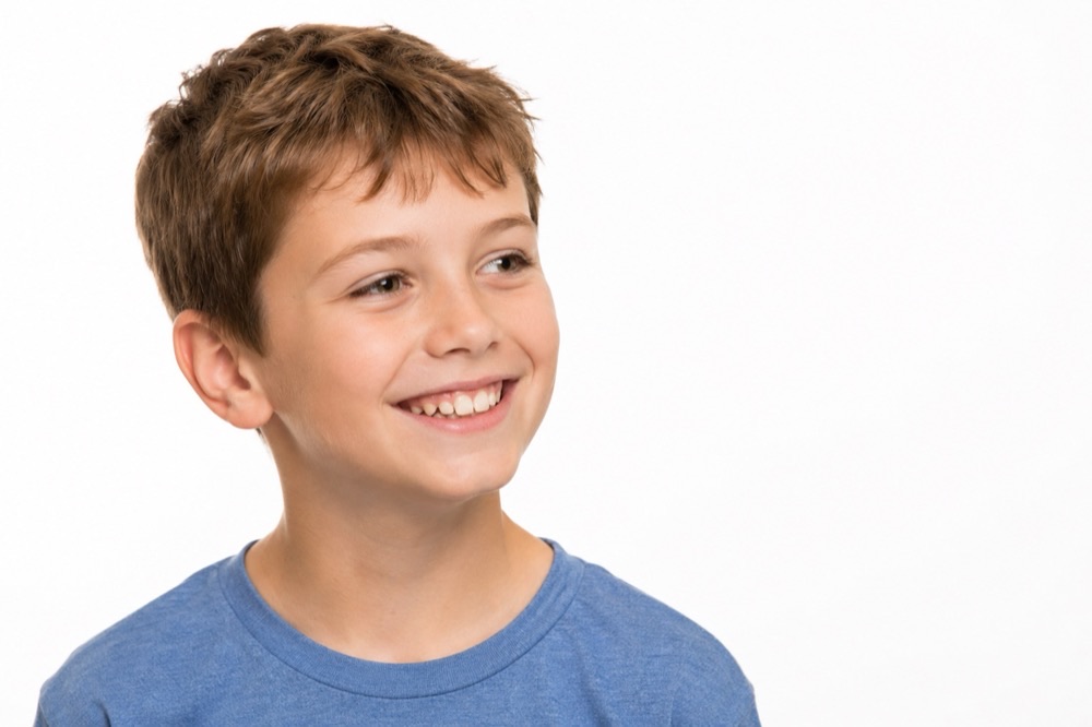 A smiling young boy
